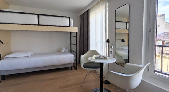 Bright, spacious and modern hotel room with bunk beds and nice view in Marseille