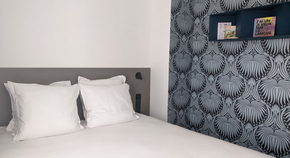 Bright, spacious and modern hotel room with king size bed in Marseille
