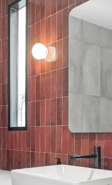 Beautiful red taled bathroom from Maison Juste hotel